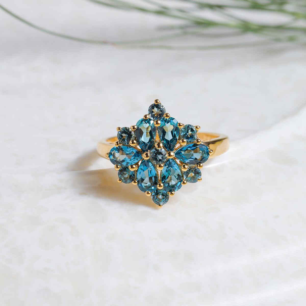 Blue topaz sale cluster ring